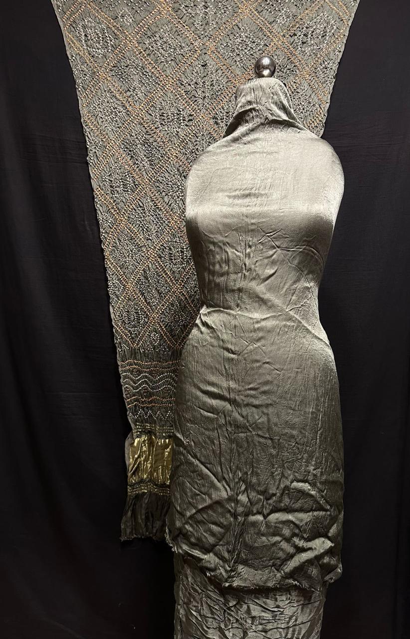 abric: Modaal Gajji Silk Work: Style: Hand BandhaniProduct Type: Suit SetPattern: Lagdi PattaGive me all the details which I asked for. Dry Clean Piece