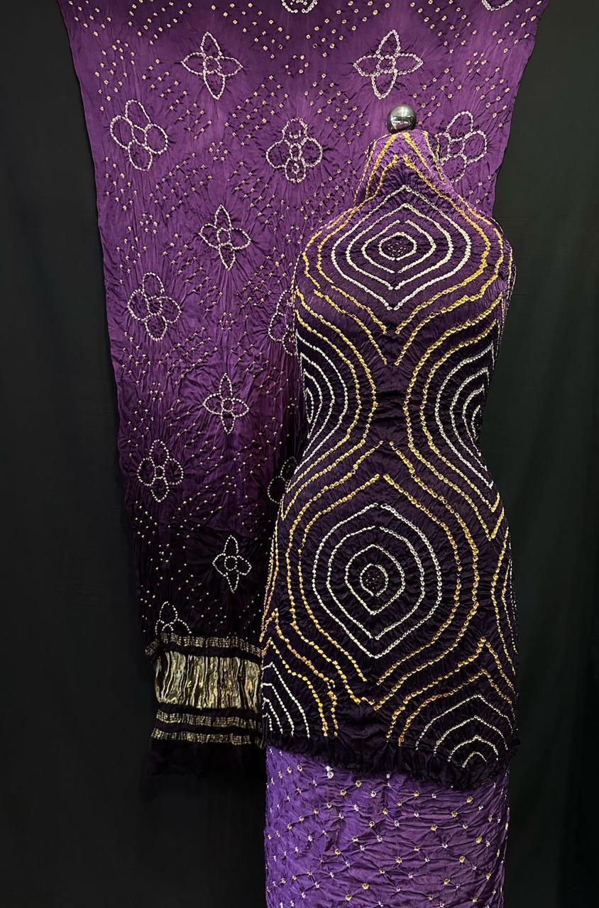 "Royal purple Bandhani suit set with diamond motifs and floral dupatta in Modaal Gajji Silk – Anita Jain Fashions""Royal purple Bandhani suit set with diamond motifs and floral dupatta in Modaal Gajji Silk – Anita Jain Fashions"