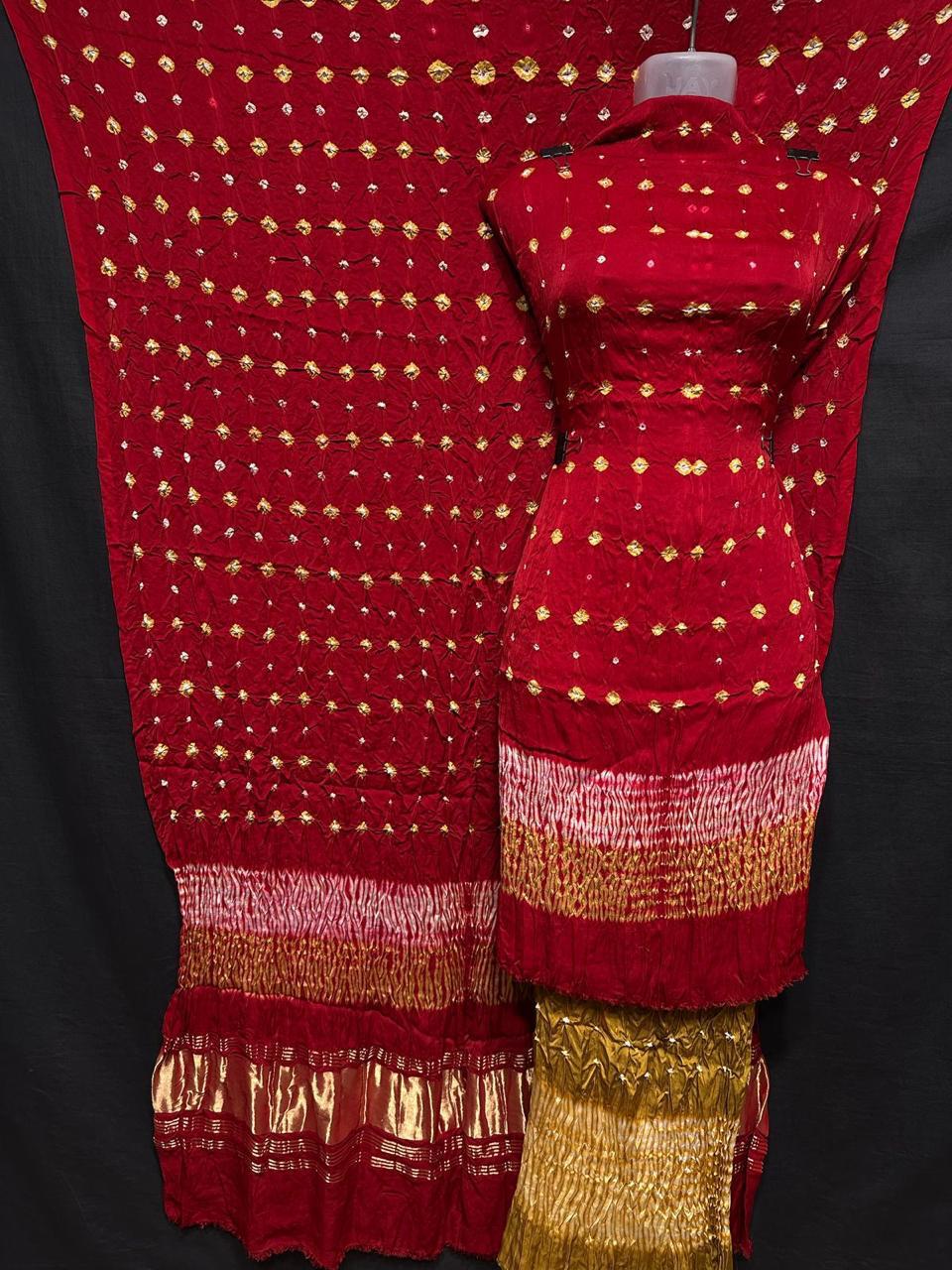 "Red Modaal Gajji Silk suit set with golden Bandhani work and Lagdi Patta dupatta – Anita Jain Fashions""Red Modaal Gajji Silk suit set with golden Bandhani work and Lagdi Patta dupatta – Anita Jain Fashions"