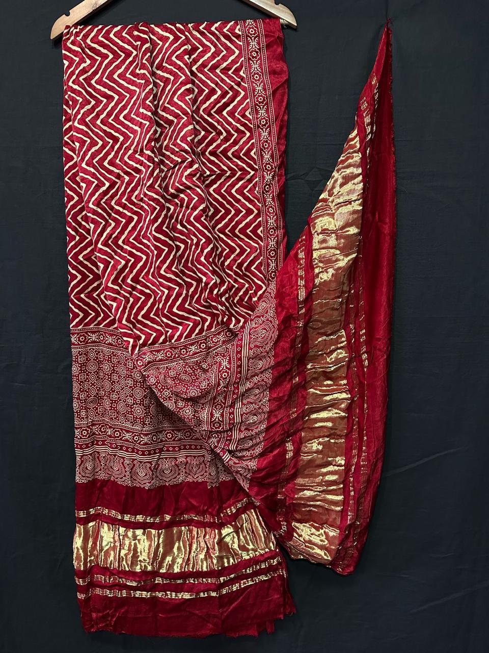 "Red Modaal Gajji Silk Bandhani Suit Set with golden Lagdi Patta dupatta and zig-zag pattern"
