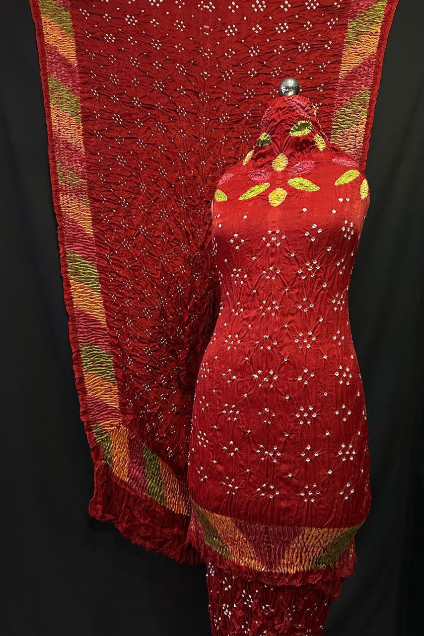 "Rust red Bandhani suit set with leaf motif work and multicolor border dupatta in Modaal Gajji Silk – Anita Jain Fashions""Rust red Bandhani suit set with leaf motif work and multicolor border dupatta in Modaal Gajji Silk – Anita Jain Fashions"