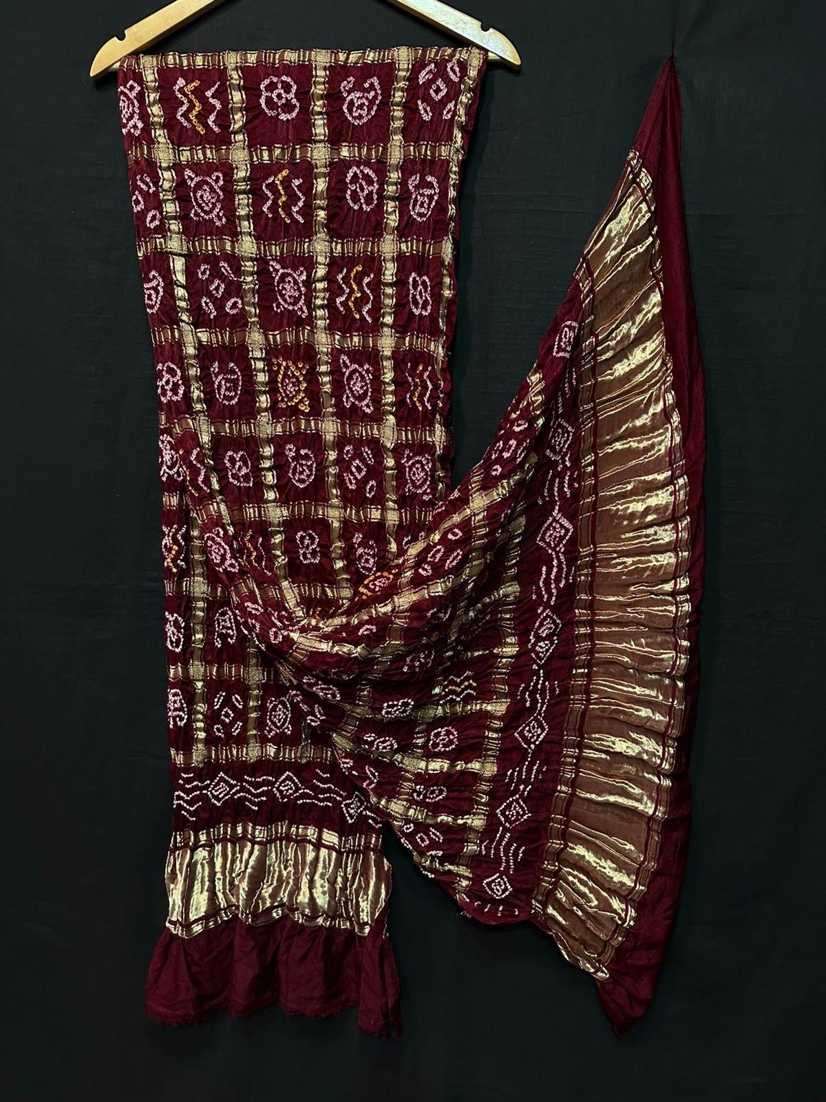 "Maroon Bandhani suit set in Modaal Gajji Silk with box motifs and golden striped dupatta – Anita Jain Fashions""Maroon Bandhani suit set in Modaal Gajji Silk with box motifs and golden striped dupatta – Anita Jain Fashions"