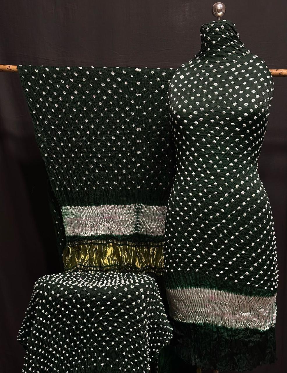 "Bottle Green Modaal Gajji Silk 3-piece suit set with white Bandhani and Lagdi Patta dupatta – Anita Jain Fashions""Bottle Green Modaal Gajji Silk 3-piece suit set with white Bandhani and Lagdi Patta dupatta – Anita Jain Fashions"