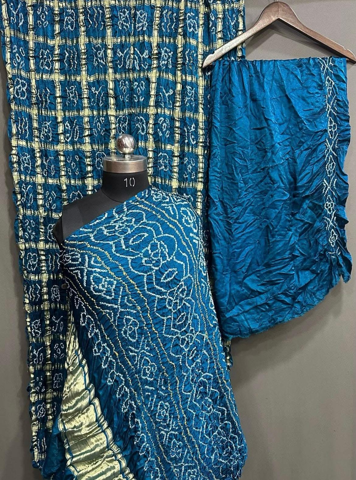 “Teal Blue Modaal Gajji Silk Suit with Hand Bandhani Work and Golden Lagdi Patta Dupatta – Anita Jain Fashions”