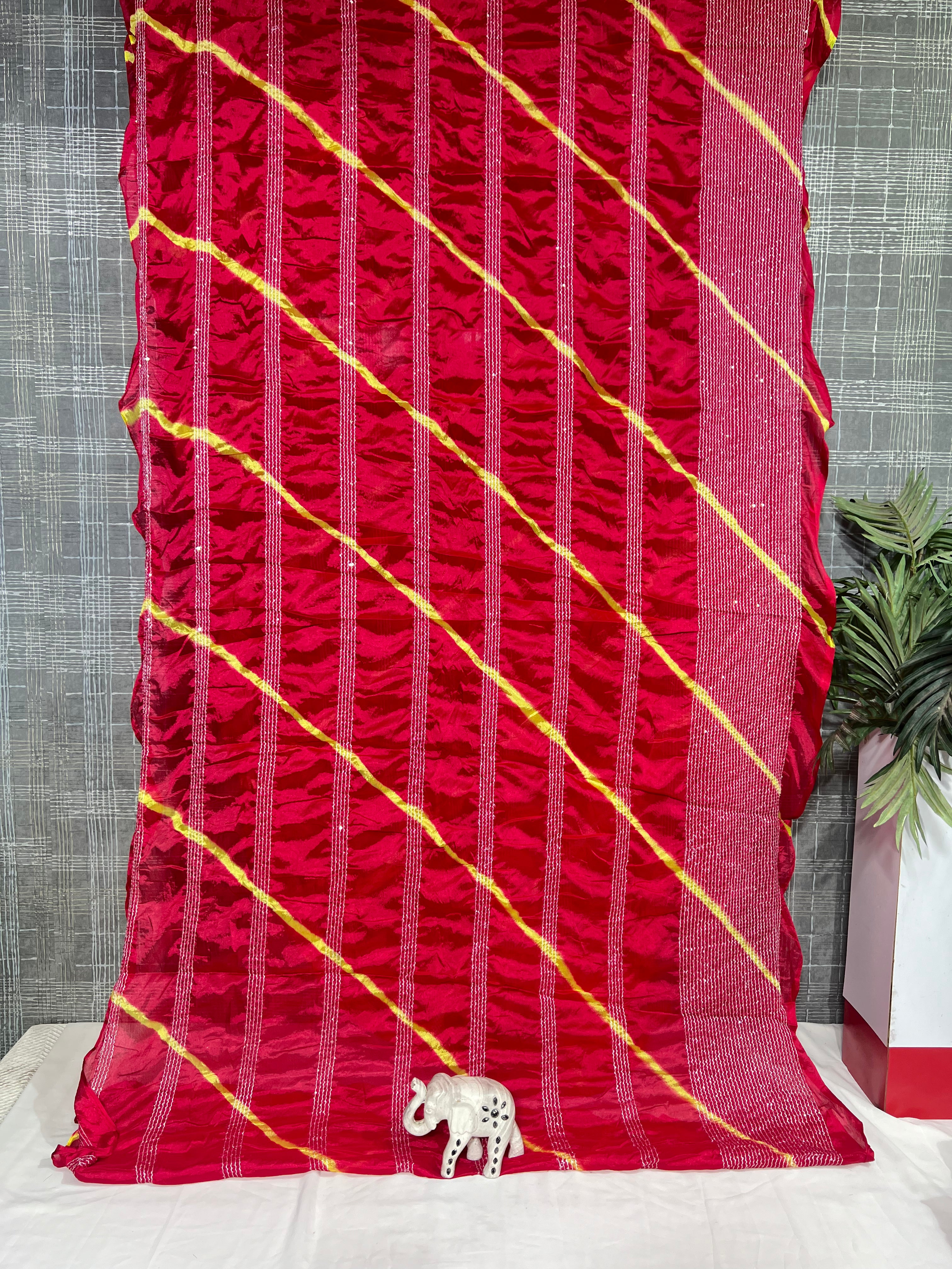 Rose Red Chiffon Saree with Thread Sequencing Lines & Lahriya Print (No Blouse) - Anita Jain Fashions