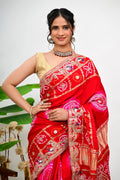Red silk saree with gold zari and floral embroidery