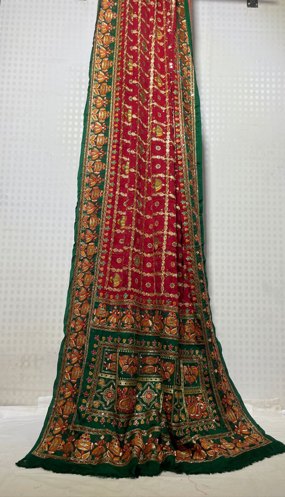 Pure Gazzi Silk with traditional Bandhani print and khatli mirror work