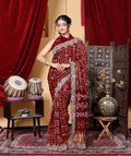 Burgundy Silk Saree with White Threadwork & Gold Fringe