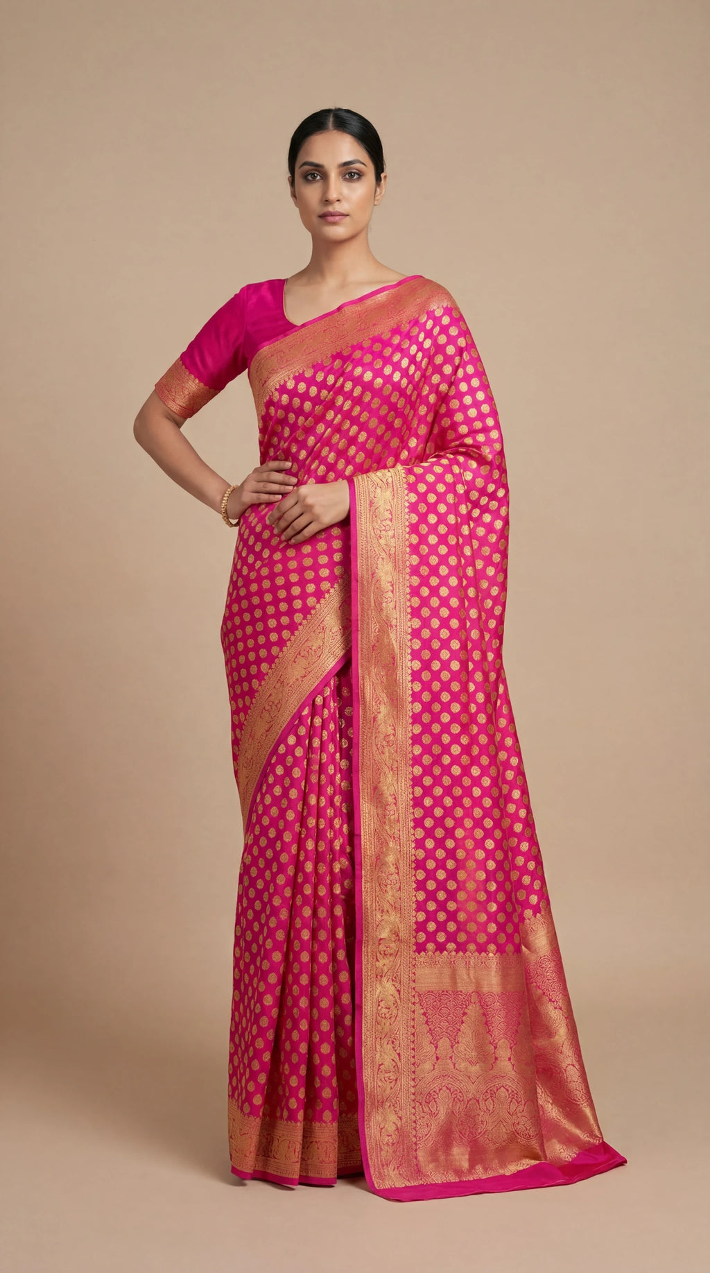 Pink georgette saree with gold weaving